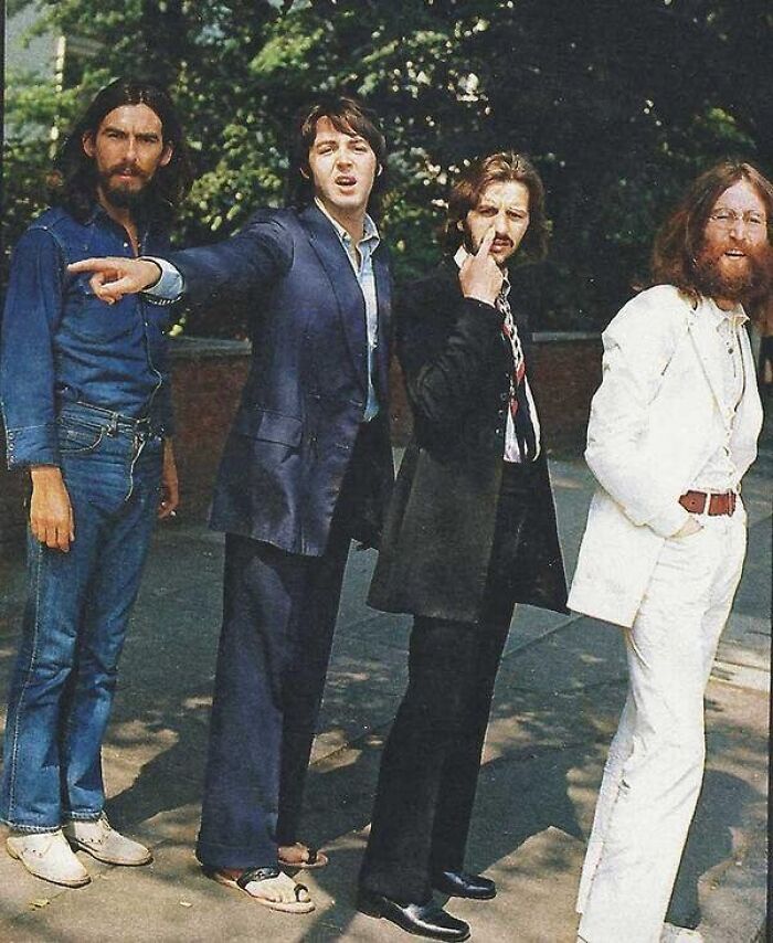 Four men posing outdoors in distinct vintage styles, captured in photos showing alternative angles and unseen perspectives.